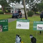 Hole 16 sponsor signs Celeste Kaptur, Suncoast Veterinary and Lynn Billi with Cara and Nicky and Simon BIlli