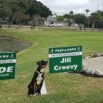 Hole 8 sponsor signs Jill Creevy and Wilde with Handsome