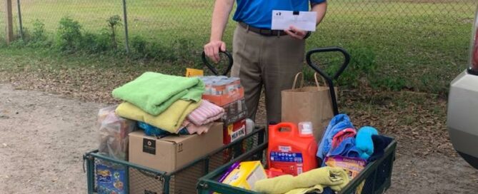 Jason delivering the 2 cart loads of donations to Satchels.