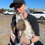 Roscoe giving a fan a kiss at the market.