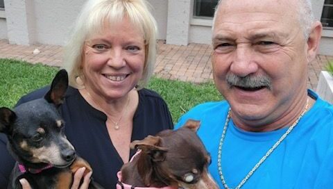 Figgy with his new mom and dad and sister Molly.