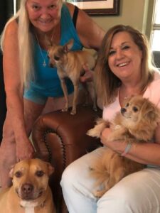 Harper sitting with his new family.