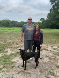 Rey with his new mom and dad.