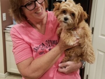 Mom holding Lulu.