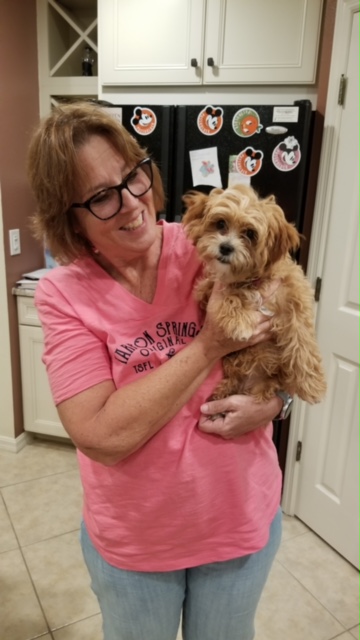 Mom holding Lulu.