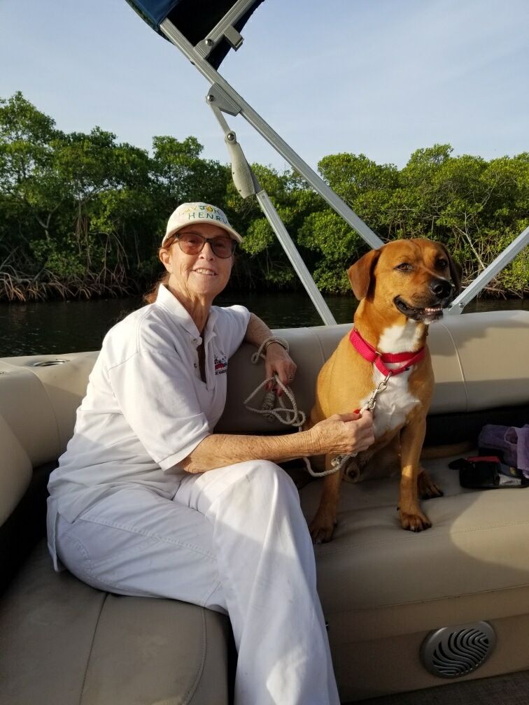 Duey on the boat with his new mom.