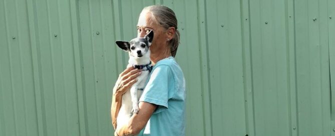 Maya in the arms of her new mom.