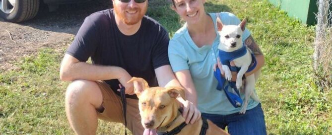 Coppertop sitting with his new mom and dad leaving Satchel's.