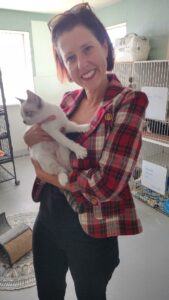 Macy in Satchel's cat room in mom's arms.