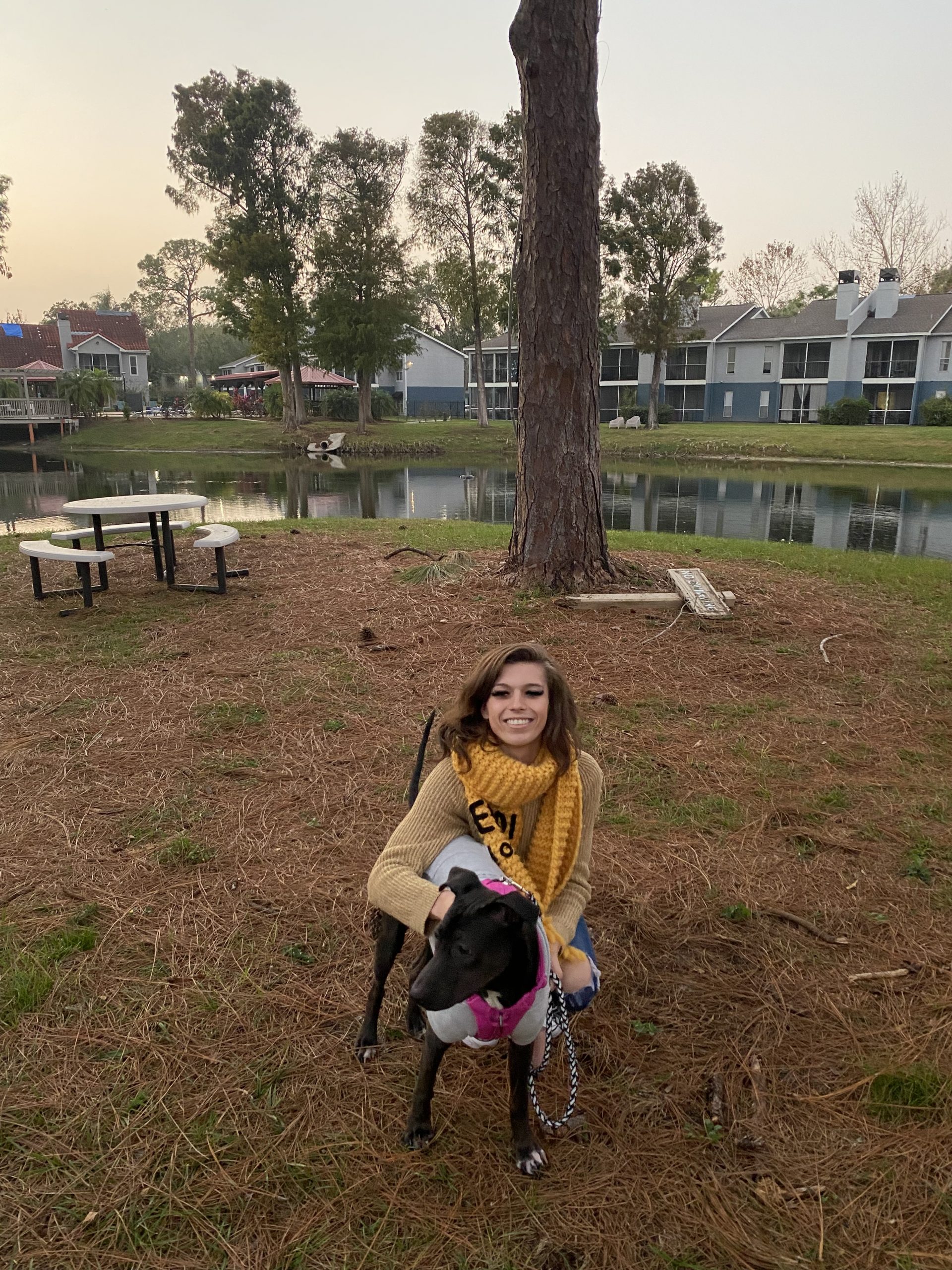 Nova in an outside area by the canal with her new mom.