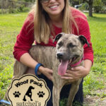 Ella posing with Woof Pack leader Jill.