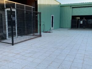 New screen and patio blocks outside the cat room door.