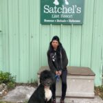 Brady sitting outside Satchel's with his new mom