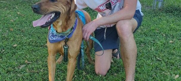 Luca standing beside his new best friend outside Satchel's.