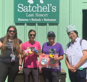 Ringling students with Michal Anne and Jill from Satchel's presenting the adoption bags.