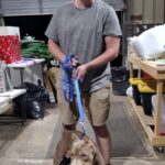 Ralo with his new dad in the front, storage building at Satchel's. (Out of the rain.)