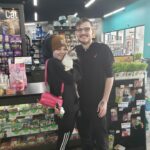 Enola in the arms of his new family.