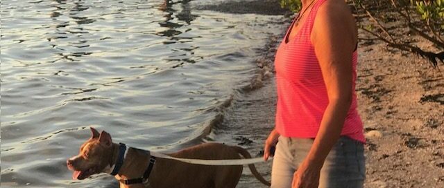 Cowboy looking out over the water with mom.