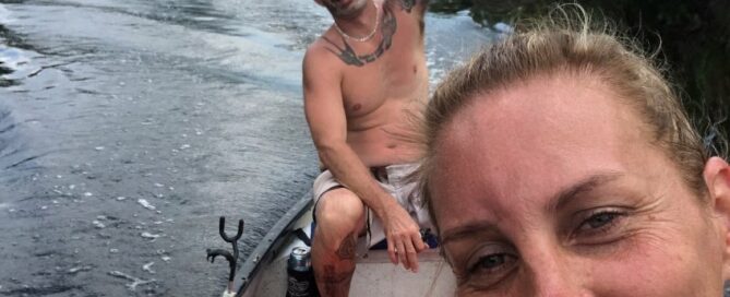 LouLou on the boat with dad and friend